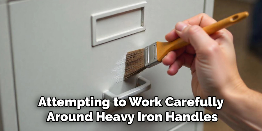 Attempting to Work Carefully 
Around Heavy Iron Handles