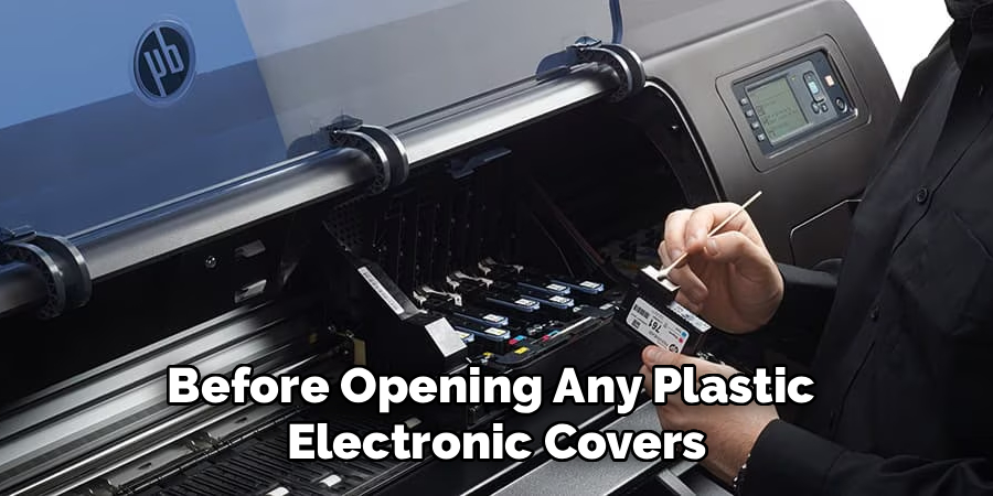 Before Opening Any Plastic 
Electronic Covers