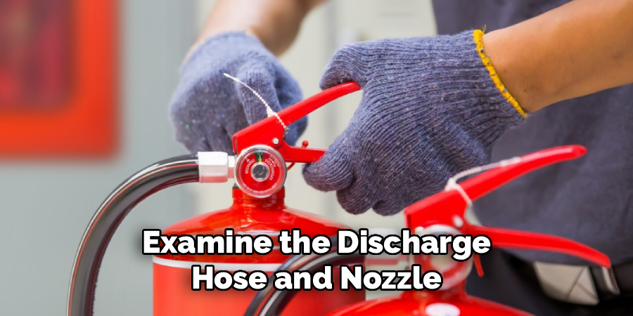 Examine the Discharge Hose and Nozzle