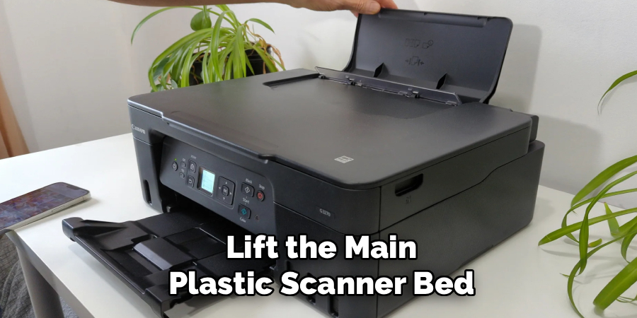 Lift the Main
Plastic Scanner Bed
