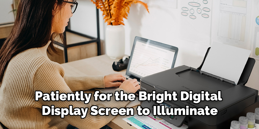 Patiently for the Bright Digital 
Display Screen to Illuminate