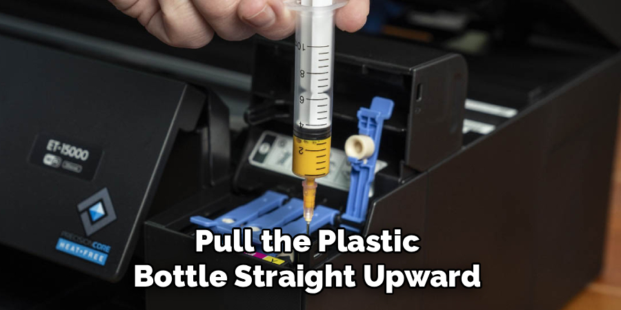 Pull the Plastic 
Bottle Straight Upward 