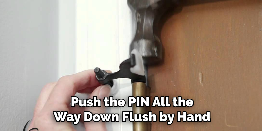 Push the PIN All the
Way Down Flush by Hand
