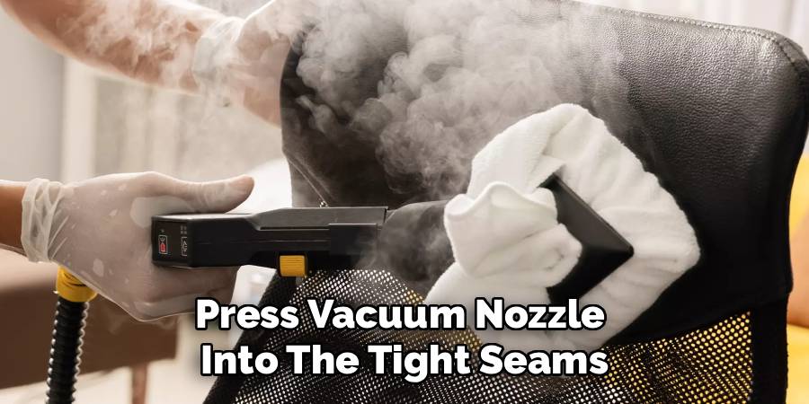 Press Vacuum Nozzle 
Into The Tight Seams