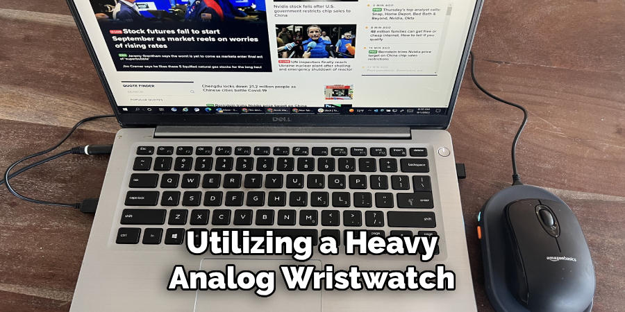 Utilizing a Heavy 
Analog Wristwatch 